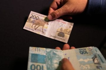 Inadimplência cai ao menor nível desde início da pandemia, diz CNC